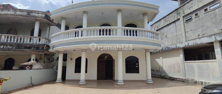 Rumah 2 Lantai Bagus Unfurnished di Taman Harapan Indah, Batam 1