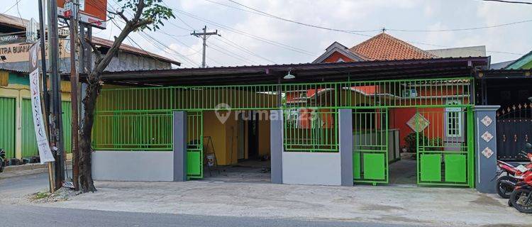 Ruang usaha dan rumah siap huni 1