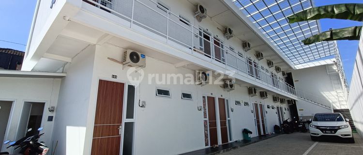 Two-story boarding house with 24 doors in the city center of Purwokerto. 1